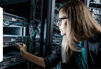 A woman looking at technology machines